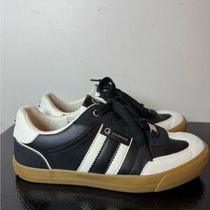 black and white GBG Los Angeles (Guess by Guess) low-top sneakers with a gum